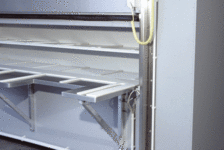 Maßgeschneiderte Temperöfen mit Paternostern für die Trocknung und Temperung großer Stückzahlen von Bauteilen 